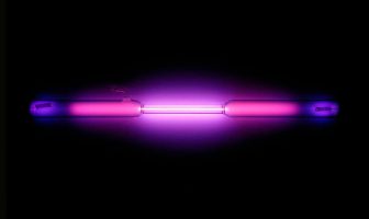 Vial containing a violet glowing gas