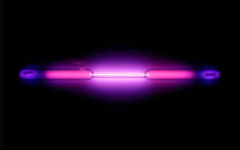 Vial containing a violet glowing gas